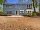 Blue home exterior showcasing the backyard at 6370 Maid Marion Close, Alpharetta, GA 30005