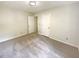 Bedroom with neutral paint and carpet and an entrance into the ensuite at 6370 Maid Marion Close, Alpharetta, GA 30005
