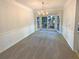 Inviting dining room with a chandelier, bay window, and neutral carpet at 6370 Maid Marion Close, Alpharetta, GA 30005