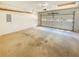 Spacious garage featuring an automatic door at 6370 Maid Marion Close, Alpharetta, GA 30005