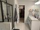 Bathroom showcases double sinks, shower stall, and a walk-in closet at 6780 Cedar Glen Rd, Peachtree Corners, GA 30360