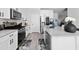 Well-equipped kitchen featuring granite countertops, stainless steel appliances, and modern finishes at 6780 Cedar Glen Rd, Peachtree Corners, GA 30360