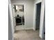 Convenient laundry room with washer, dryer, and wire shelving at 6780 Cedar Glen Rd, Peachtree Corners, GA 30360