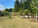 Recreation area with benches and landscaping offers a relaxing community space for residents at 6780 Cedar Glen Rd, Peachtree Corners, GA 30360