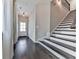Inviting hallway with hardwood floors, staircase, and natural light from the front door at 1020 Broadview Dr, Marietta, GA 30062