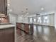 Open-concept kitchen features an island with bar seating and modern stainless steel appliances at 1020 Broadview Dr, Marietta, GA 30062