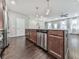 Open concept kitchen with a dark wood island and stainless steel dishwasher at 1020 Broadview Dr, Marietta, GA 30062