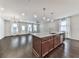 Spacious open concept kitchen featuring stainless steel appliances and a dark wood island at 1020 Broadview Dr, Marietta, GA 30062