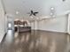 Open-concept living room with kitchen island and hardwood floors at 1020 Broadview Dr, Marietta, GA 30062