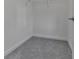 Walk-in closet featuring carpet and metal shelving for maximizing storage space at 1020 Broadview Dr, Marietta, GA 30062