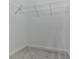 Walk-in closet with carpet and metal shelving for effective storage solutions at 1020 Broadview Dr, Marietta, GA 30062