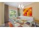 Stunning dining room featuring a glass table, modern chandelier and lovely hardwood floors at 3192 Paces Mill Rd, Atlanta, GA 30339