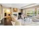Spacious living room featuring hardwood floors, a fireplace, and a balcony at 3192 Paces Mill Rd, Atlanta, GA 30339