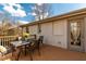 Back deck with table, chairs, and lovely brick exterior at 3224 Canary Ct, Decatur, GA 30032