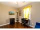 Bright bedroom or office featuring a desk, TV, and natural light at 3224 Canary Ct, Decatur, GA 30032