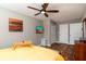 Bright bedroom features hardwood floors, ceiling fan, and ample closet space at 3224 Canary Ct, Decatur, GA 30032