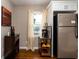 Kitchen featuring a wine rack, shelving, and stainless steel refrigerator with coffee maker at 3224 Canary Ct, Decatur, GA 30032