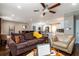 Spacious living room showcasing an open floorplan to the kitchen and dining areas at 3224 Canary Ct, Decatur, GA 30032