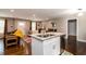 Open floorplan view of the home showcasing the kitchen island, dining and living area at 3224 Canary Ct, Decatur, GA 30032
