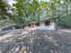 A renovated ranch-style home, complete with custom wood shutters at 221 Wonewok Dr, Canton, GA 30114
