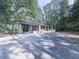 A beautifully renovated ranch-style home, complete with custom wood shutters at 221 Wonewok Dr, Canton, GA 30114