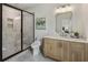 Modern bathroom with glass shower and sleek vanity at 320 Shady Grove Ln, Alpharetta, GA 30009