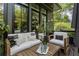 Relaxing outdoor seating area on a deck featuring comfortable furniture and a stylish decor at 320 Shady Grove Ln, Alpharetta, GA 30009