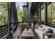 Inviting outdoor living space on a deck with comfortable seating and dining areas at 320 Shady Grove Ln, Alpharetta, GA 30009