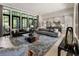 Bright and airy living space showcasing an open layout with modern furniture and natural light at 320 Shady Grove Ln, Alpharetta, GA 30009