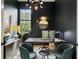 Stylish home office with modern lighting, built-ins, and plenty of workspace at 320 Shady Grove Ln, Alpharetta, GA 30009