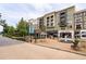Vibrant shopping district with upscale stores and a charming fountain, fostering a delightful atmosphere at 320 Shady Grove Ln, Alpharetta, GA 30009