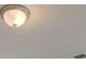 Close-up of an indoor ceiling and light fixture at 320 Tulip Dr, Covington, GA 30016
