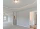 Open living room with access to other rooms and lots of natural light at 320 Tulip Dr, Covington, GA 30016