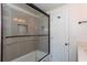Bathroom featuring a bathtub with glass shower doors at 4700 Cascade Sw Rd, Atlanta, GA 30331
