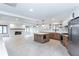 Spacious kitchen with white countertops, wooden cabinets, an island, and stainless steel appliances at 4700 Cascade Sw Rd, Atlanta, GA 30331