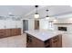 This gourmet kitchen features quartz countertops, modern lighting, and lots of storage at 4700 Cascade Sw Rd, Atlanta, GA 30331