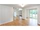 Open concept living room featuring hardwood floors and large windows at 4700 Cascade Sw Rd, Atlanta, GA 30331