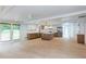 Spacious living area with open kitchen, stainless steel appliances, and ample seating at 4700 Cascade Sw Rd, Atlanta, GA 30331