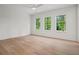 Spacious and bright bedroom with hardwood floors and large windows at 4785 Merlendale Ct, Atlanta, GA 30327