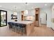 Spacious kitchen features a large island with seating, stainless steel appliances, and modern lighting at 4785 Merlendale Ct, Atlanta, GA 30327