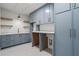 Well-equipped laundry room with ample storage, counter space, and modern appliances at 4785 Merlendale Ct, Atlanta, GA 30327