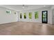 Spacious living room featuring hardwood floors, abundant natural light, and backyard access at 4785 Merlendale Ct, Atlanta, GA 30327