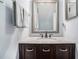 Elegant bathroom vanity features a marble countertop, modern sink, and a decorative mirror at 6700 Roswell Ne Rd # 25A, Sandy Springs, GA 30328