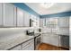 Modern kitchen featuring granite countertops, stainless steel appliances, and ample cabinet space at 6700 Roswell Ne Rd # 25A, Sandy Springs, GA 30328