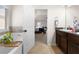 Bathroom features dual sinks and a bathtub with a view of the bedroom at 1181 Gateview Dr, Lawrenceville, GA 30046