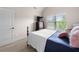 Bedroom with TV, dresser, and large window with natural light at 1181 Gateview Dr, Lawrenceville, GA 30046