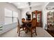 Elegant dining room with coffered ceilings, large window, and beautiful wood furniture at 1181 Gateview Dr, Lawrenceville, GA 30046