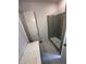 Bathroom featuring a glass shower, neutral tile, and modern vanity at 1276 Longreen Terrace Nw # 115, Atlanta, GA 30318