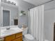 Clean bathroom featuring a shower, vanity, toilet, and neutral color scheme at 141 Weatherstone Dr, Woodstock, GA 30188