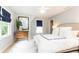 Serene bedroom featuring light gray walls, roman shades, and a neutral headboard at 1486 Brooklyn Nw Ave, Atlanta, GA 30309